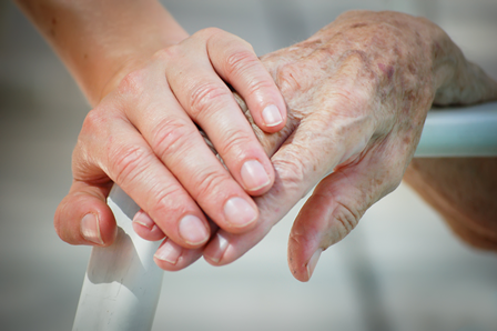 PCA Council image of one hand touching another hand